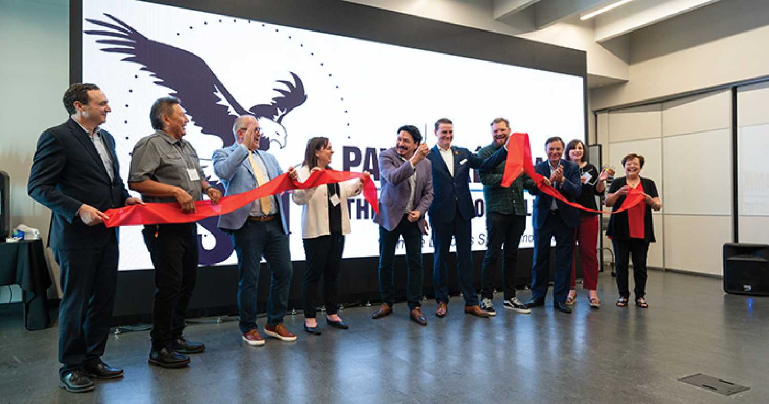 The ribbon cutting at the grand opening of paw�cik�wikamik: Nutrien MakerLodge